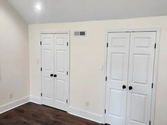 A finished attic conversion with new doors and flooring
