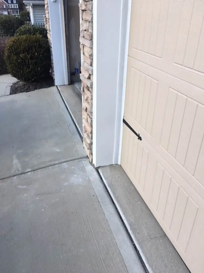 The finished garage door and new trim, photographed close